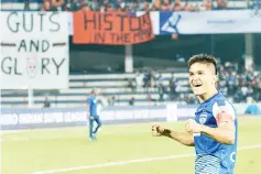  ??  ?? Indian club Bengaluru FC player Sunil Chhetri acknowledg­es the crowds after the team’s 3-1 win against Pune City in the Hero ISL semi finals match at the Sree Kanteerava Stadium, Bangalore. - AFP photo