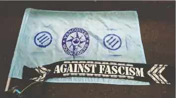  ?? — TWITTER ?? Southsider­s vice-president Paul Sabourin-Hertzog had an anti-facism flag seized during the Whitecaps game Saturday in Portland.