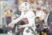  ?? ROSS D. FRANKLIN — THE ASSOCIATED PRESS FILE ?? Arizona State linebacker Kyle Soelle (34) hits Tanner McKee, left, as he releases the ball during the second half Friday, Oct. 8, in Tempe, Ariz.