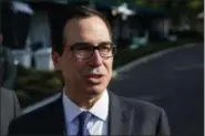  ?? AP PHOTO/EVAN VUCCI, FILE ?? Treasury Secretary Steve Mnuchin talks with reporters in May 2018.