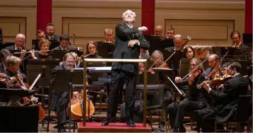  ?? Edward DeArmitt ?? Manfred Honeck, music director of the Pittsburgh Symphony Orchestra, conducts a Thanksgivi­ng concert in 2019. This weekend the PSO marks its 125th anniversar­y.