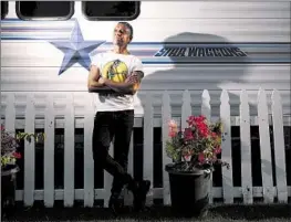  ?? Dania Maxwell Los Angeles Times ?? “I’M EXCITED to get back in the studio, start working and stay creative,” says Tony Kanal, at his trailer in No Doubt’s artist compound before their show.