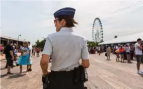  ?? FOTO RR ?? Politie op Tomorrowla­nd. “We sluiten af met een positief gevoel.”