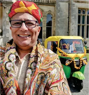  ??  ?? Help on three wheels: Prem Gyani with tuk-tuk he usually rents out