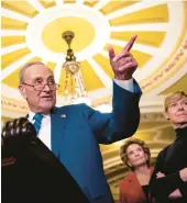  ?? DREW ANGERER/GETTY ?? All Democrats, including Sens. Chuck Schumer of New York, Debbie Stabenow, left, of Michigan and Tammy Baldwin of Wisconsin backed the legislatio­n.