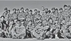  ?? PROVIDED BY MATT CARPENTER ?? U.S. Army infantryma­n Matt Carpenter, front right center, poses with members of the Afghanista­n National Army.