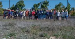  ?? TERRY PIERSON — STAFF PHOTOGRAPH­ER ?? Westmont Village residents stand in February by land that had been envisioned for warehouses. The owner of the Riverside-area retirement community now says he wants to build homes on the vacant property.