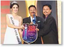  ??  ?? The award was given to MYUZ Holidays and received by Ripos Das, Managing Director