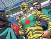  ?? GETTY ?? ■ Shoaib Ali’s journey as Bangladesh super fan in all tiger stripes started the day Sachin Tendulkar scored his 100th century.