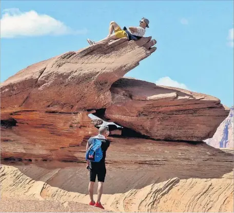  ?? Sara Lessley ?? THE UNUSUAL rock formations in Horseshoe Bend near Page in northern Arizona are fun to explore and snap photos from on high.