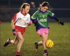  ??  ?? Rachel Cullen (Glynn) kicks the ball away from Bebhinn McDonald.