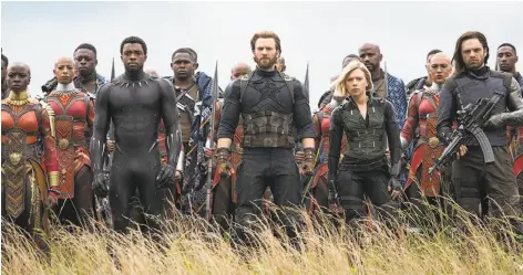  ?? Chuck Zlotnick / Marvel Studios ?? Danai Gurira (front left), Chadwick Boseman, Chris Evans, Scarlett Johansson and Sebastian Stan are among the stars of “Infinity War.”