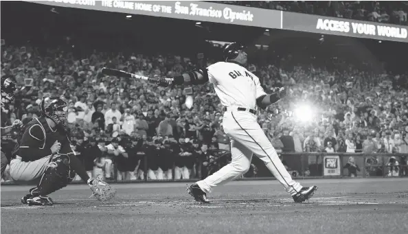  ?? JUSTIN SULLIVAN / GETTY IMAGES / FILES ?? Barry Bonds of the San Francisco Giants swings at a pitch against the San Diego Padres on Sept. 26, 2007 at AT&T Park in San Francisco, the final home game for Bonds as a member of the Giants. Bonds’ link to steroids has kept him out of the Hall of...