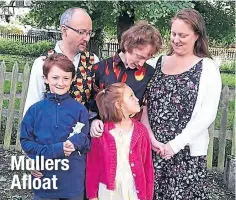  ??  ?? Gordon and Bx Muller with their three children.
Aldebaran Mullers Afloat