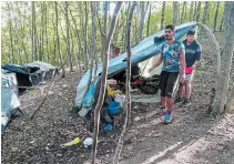  ?? EDVIN ZULIC THE ASSOCIATED PRESS ?? Migrants live in makeshift tents in woods by the Croatian border near Kladusa. A top UN official in Bosnia says local authoritie­s expose migrants and refugees to needless suffering.