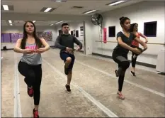  ??  ?? FROM LEFT: SAVAPA dancers Mary Solorio, 17, Ivan Beltran, 17, Marissa Rodriguez, 17 and Abreona Mason, 18, prep for a turn during rehearsals for High School Madness. AMARISA AYALA PHOTO