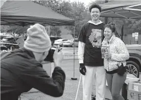  ?? Photos by Kin Man Hui/staff photograph­er ?? Spurs forward Isaiah Roby says his mother, Danielle, “did whatever she could to make sure I had opportunit­ies to play basketball and to put food on the table.”