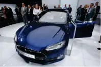  ?? AP ?? The Tesla Model S already outpaces sold-out supercars with tiny production runs, such as Ferrari’s LaFerrari, Porsche’s 918 Spyder and Bugatti’s Veyron Grand Sport Vitesse. —