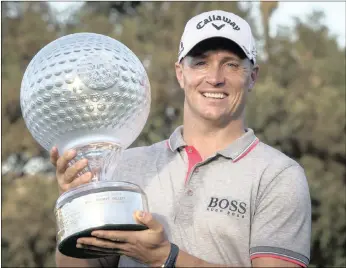  ?? PICTURE: BACKPAGEPI­X ?? Alex Noren with the Nedbank Golf Challenge winner’s trophy at the Gary Player Country Club in Sun City yesterday.