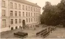  ?? Photograph: Dietrich ?? Rollcall and saluting the flag at NPEA Rügen around 1942.