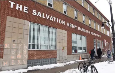  ?? JOHN RENNISON THE HAMILTON SPECTATOR ?? Results from testing Wednesday revealed 18 residents and three staff members of the Booth Centre shelter on York Boulevard have COVID-19.