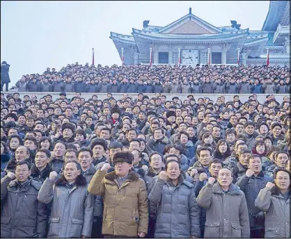  ?? AFP ?? People gesture during a rally supporting North Korean leader Kim Jong-un in Pyongyang on Tuesday.