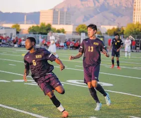  ?? ROBERTO E. ROSALES/JOURNAL ?? Nigel Mwamba, left, looks to get back on defense alongside teammate Jesus Aguilera during a recent game against Albuquerqu­e Academy. The Hornets are 5-6.