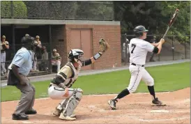  ?? Tommy Romanach / Rome News-Tribune ?? Coosa’s Peyton Moore takes a swing during Game 3 of the first round of the Class AA state playoffs Saturday against Wesleyan. The Eagles lost 12-0.