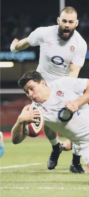  ??  ?? England’s Ben Youngs dives in to score his sides second try during the Guinness Six Nations match at the