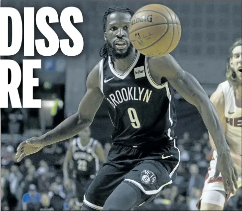  ?? AP ?? DeMarre Carroll goes after a loose ball during a recent game against the Miami Heat. The former Raptor has bounced back this season with the Brooklyn Nets, averaging career bests in scoring, rebounding and made three-pointers.