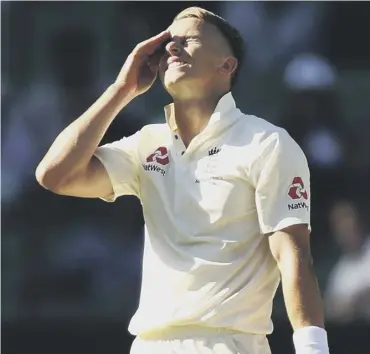  ??  ?? 0 England debutant Tom Curran thought he’d got David Warner, only for it to be judged a no ball.