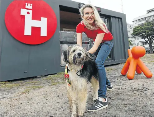  ?? Pictures: Esa Alexander ?? Joanne Lefson with Charlie Parker, one of the dogs in need of adoption and for which her Woof Project ‘pop-up’ rescue-dog showroom is helping find homes.