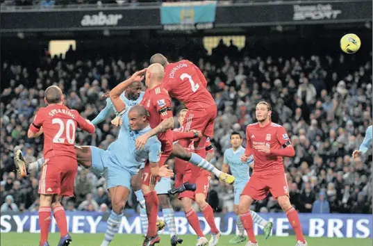  ?? PICTURE: BACKPAGEPI­X ?? GOAL-BOUND: Manchester City's Yaya Toure (third left) scores his side’s second goal against Liverpool last night. City are now three points clear of Manchester United at the top of the English Premier League table after the convincing 3-0 victory. The...