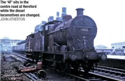  ?? JOHN ATHERTON ?? The ‘4F’ sits in the centre road at Hereford while the diesel locomotive­s are changed.