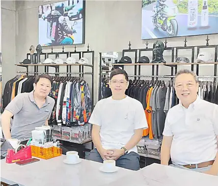  ?? ?? THE Dri+ concept store is hatched by (from right) Burlington Industries general manager Ruddy Tan, Dri+ brand manager Noel Chua and production manager Dexter Tan.