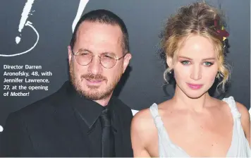  ??  ?? Director Darren Aronofsky, 48, with Jennifer Lawrence, 27, at the opening of Mother!