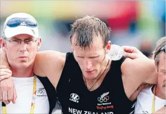  ?? Photo: KENT BLECHYNDEN/FAIRFAX NZ ?? Beijing flashback: Mahe Drysdale after collapsing at the end of the men’s
single
scull
final in 2008. Steven Alker, 40, has made a promising start to the 141st Open Championsh­ip at Royal Lytham & St Annes in Lancashire, England. Alker carded a...