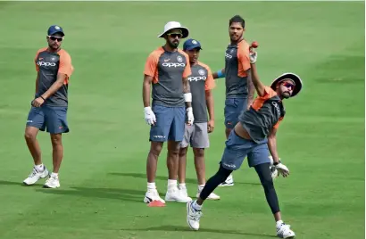  ?? AFP ?? Indian cricketers during a training session ahead of the second Test against West Indies. —