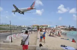  ?? JUDY FITZPATRIC­K, THE ASSOCIATED PRESS ?? A New Zealand tourist was killed by the blast from a jetliner landing at the Princess Juliana Internatio­nal Airport in St. Maarten.