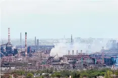  ?? ASSOCIATED PRESS ?? Heavy fighting at the besieged steel plant in Mariupol as Russian forces attempt to finish off the city’s last-ditch defenders and complete the capture of the strategica­lly vital port city in eastern Ukraine on Thursday.