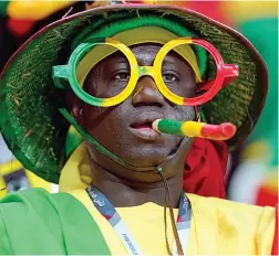  ?? ?? Vibrant, but not victorious: A Senegal fan watches on