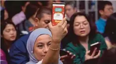  ??  ?? APLIKASI Shopee di telefon pintar.