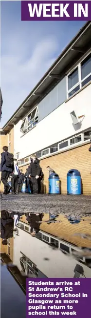  ??  ?? Students arrive at St Andrew’s RC Secondary School in Glasgow as more pupils return to school this week