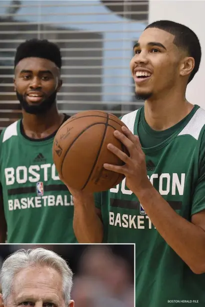  ?? BOSTON HErALd FiLE MATT STONE / BOSTON HErALd FiLE ?? GREEN LIGHT? Celtics president of basketball operations Danny Ainge, left, told the Herald on Thursday he is hoping that in the next day or two the state will allow the club to reopen its practice facility under highly structured conditions. Jayson Tatum, above right, and Jaylen Brown smile during mini-camp at the Celtics’ practice facility in Waltham in 2017.