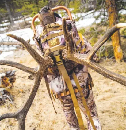  ??  ?? The new line of backpacks from SJK Outdoors, in collaborat­ion with Krytek camouflage, is designed for athletic hunters who often hike the high country under a heavy load. Provided by Clear Fork Collective