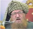  ?? — AFP ?? ISLAMABAD: Maulana Sami ul-Haq, head of Defense of Pakistan Council, a coalition of around 40 religious and political parties, speaks during a press conference.