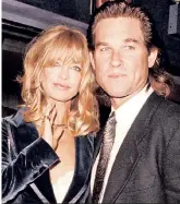  ??  ?? THEY’RE KEEPERS: Never married but inseparabl­e (movie shoots aside) for 33 years, Goldie and Kurt turn heads in NYC back in 1996.