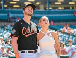 ?? TERRANCE WILLIAMS/AP ?? Trey Mancini, left, who was traded by the Orioles to the Astros on Monday, and his fiancee Sara Perlman are leaving behind the city where they met and grew as individual­s and as a couple.