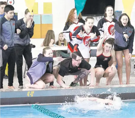  ?? GARRETT/SPECIAL TO THE MORNING CALL DAVID ?? Parkland swimmers cheer on a teammate during a meet in 2020, before the pandemic changed the way all sports were conducted.