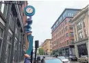  ?? KATIE LANDECK/THE PROVIDENCE JOURNAL ?? The Time Wave clock, with its squiggly design, was designed by Ellison, a California artist, as a playful counterpoi­nt to the Shepard Company Building’s more traditiona­l cast-iron clock.